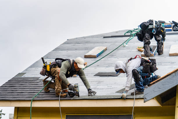 Professional Gutter Installation technician working in Mashpee, MA